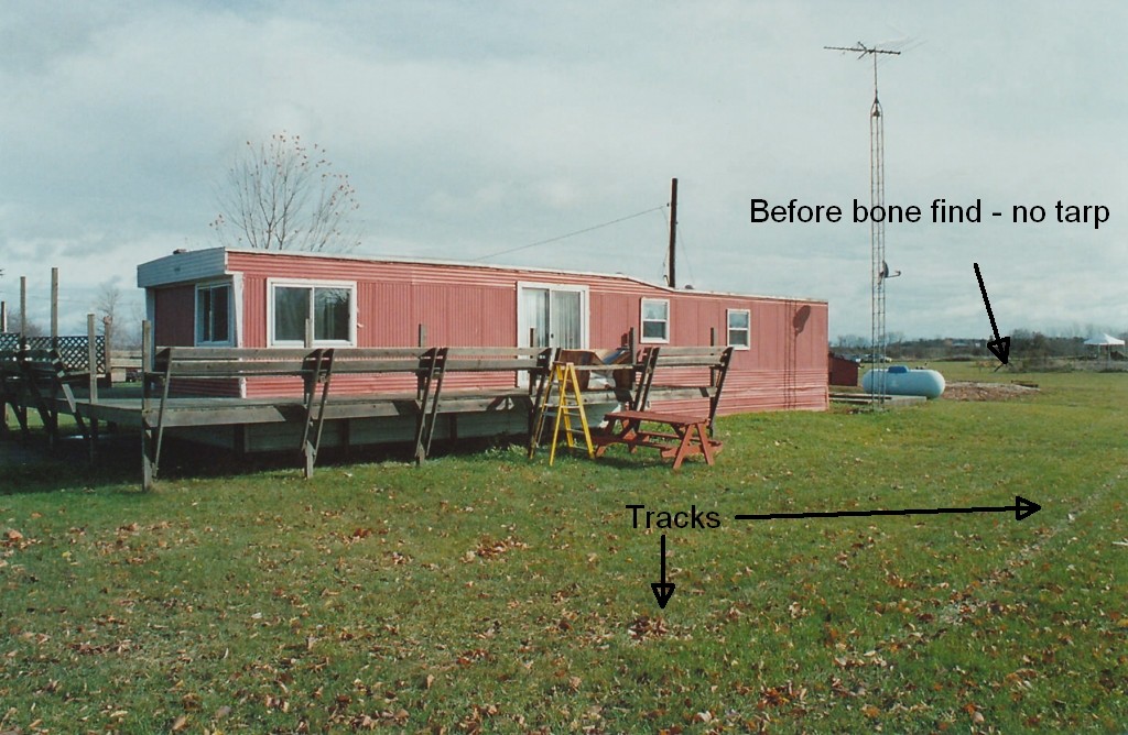 Early photo of rear of trailer before bone discovery